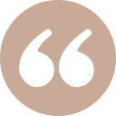 Quotation marks inside a brown circle.